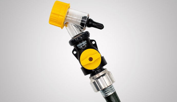 Close-up of sediment buster valve connected to a hose